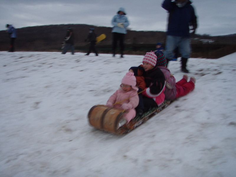 4 Grandkids Sleding 2